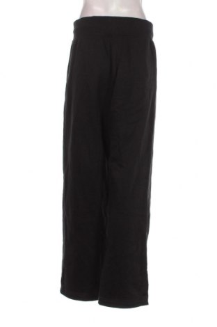 Pantaloni trening de femei Nike, Mărime M, Culoare Negru, Preț 305,92 Lei