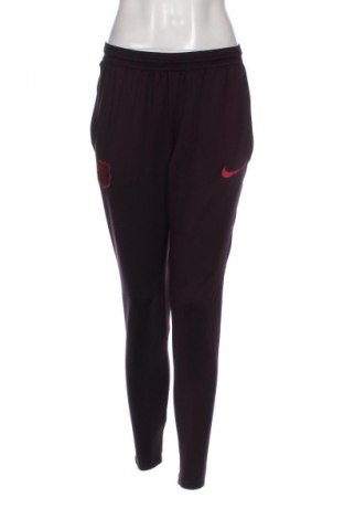Γυναικείο αθλητικό παντελόνι Nike, Μέγεθος M, Χρώμα Βιολετί, Τιμή 24,09 €