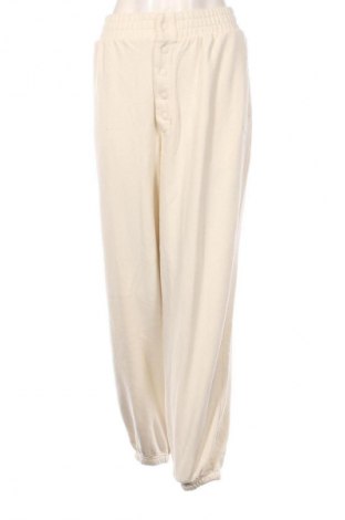 Γυναικείο αθλητικό παντελόνι PUMA, Μέγεθος L, Χρώμα Εκρού, Τιμή 23,97 €
