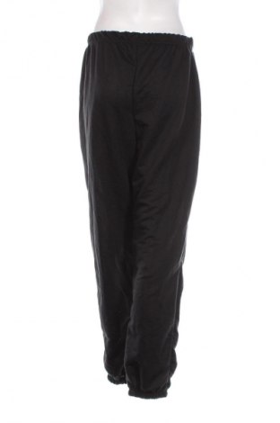Γυναικείο αθλητικό παντελόνι Pretty Little Thing, Μέγεθος XL, Χρώμα Μαύρο, Τιμή 11,86 €