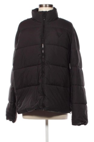Γυναικείο μπουφάν Guess, Μέγεθος XL, Χρώμα Μαύρο, Τιμή 95,62 €
