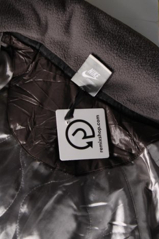 Γυναικείο μπουφάν Nike, Μέγεθος XL, Χρώμα Γκρί, Τιμή 53,81 €