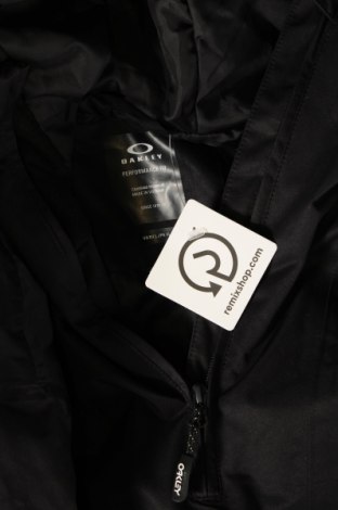 Γυναίκειο μπουφάν για χειμερινά σπορ Oakley, Μέγεθος XL, Χρώμα Μαύρο, Τιμή 141,09 €