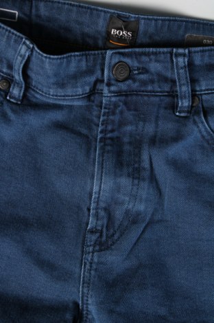 Pánske džínsy  Hugo Boss, Veľkosť S, Farba Modrá, Cena  61,80 €