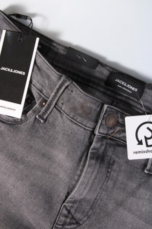 Herren Jeans Jack & Jones, Größe M, Farbe Grau, Preis 26,68 €