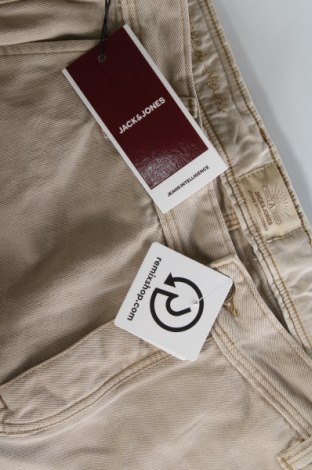 Męskie jeansy Jack & Jones, Rozmiar M, Kolor Beżowy, Cena 153,27 zł