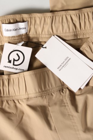 Pánske nohavice  Calvin Klein Jeans, Veľkosť M, Farba Béžová, Cena  44,23 €