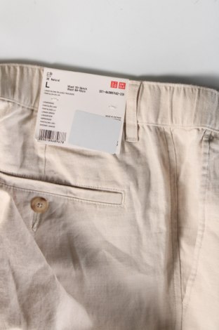 Herrenhose Uniqlo, Größe L, Farbe Ecru, Preis € 30,13