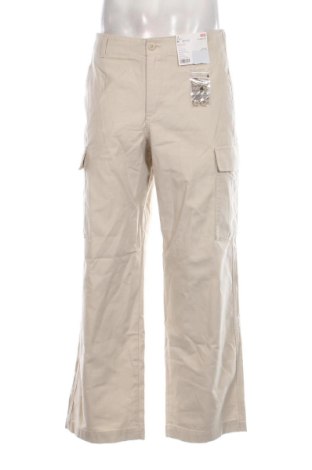 Pantaloni de bărbați Uniqlo, Mărime M, Culoare Bej, Preț 239,39 Lei