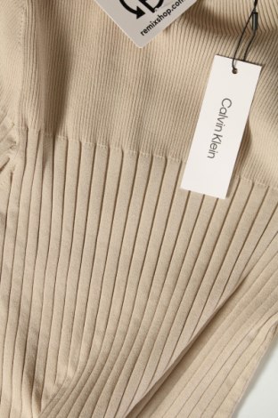 Рокля Calvin Klein, Размер L, Цвят Бежов, Цена 154,55 лв.