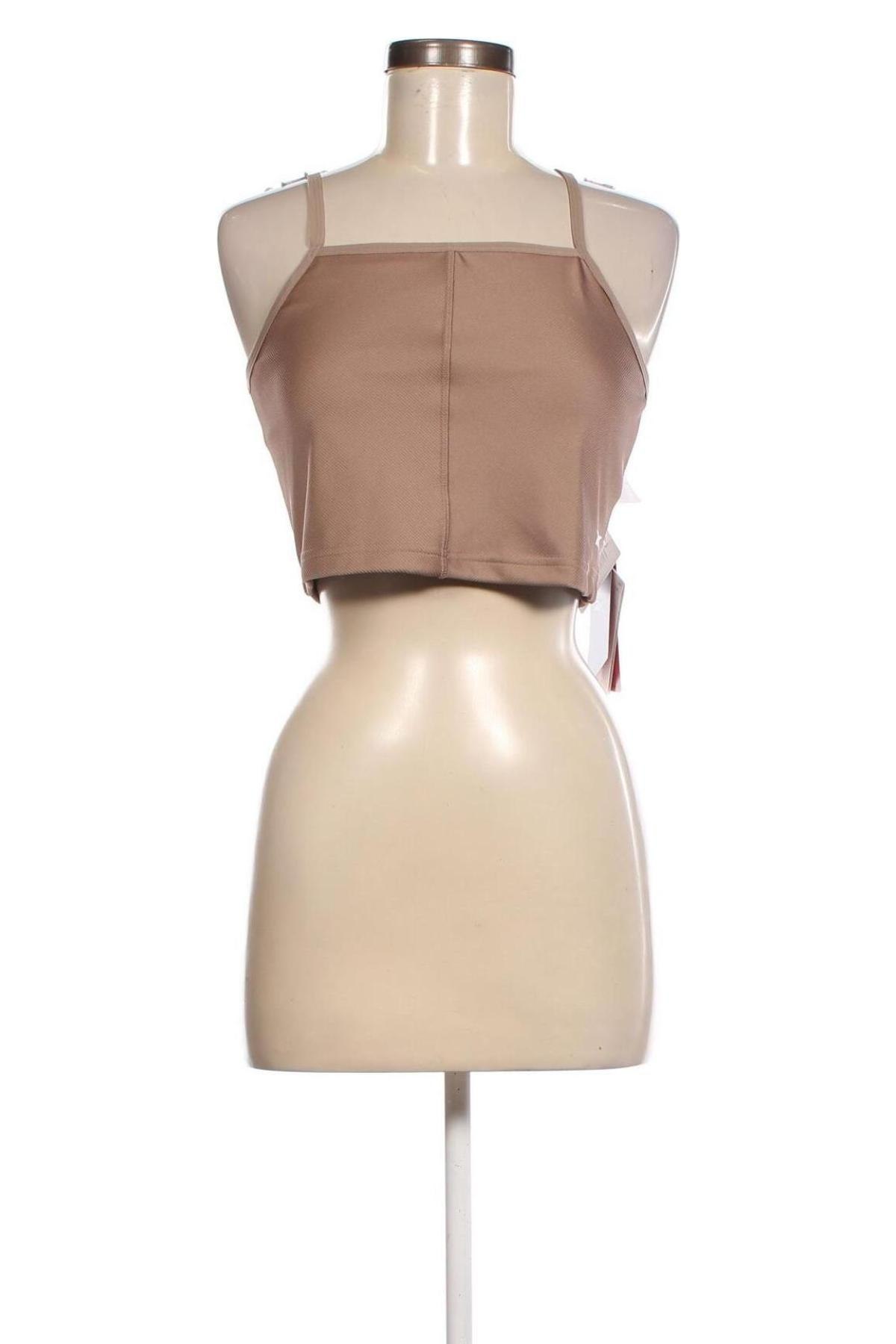 Damen Sporttop Reebok, Größe L, Farbe Beige, Preis 17,86 €