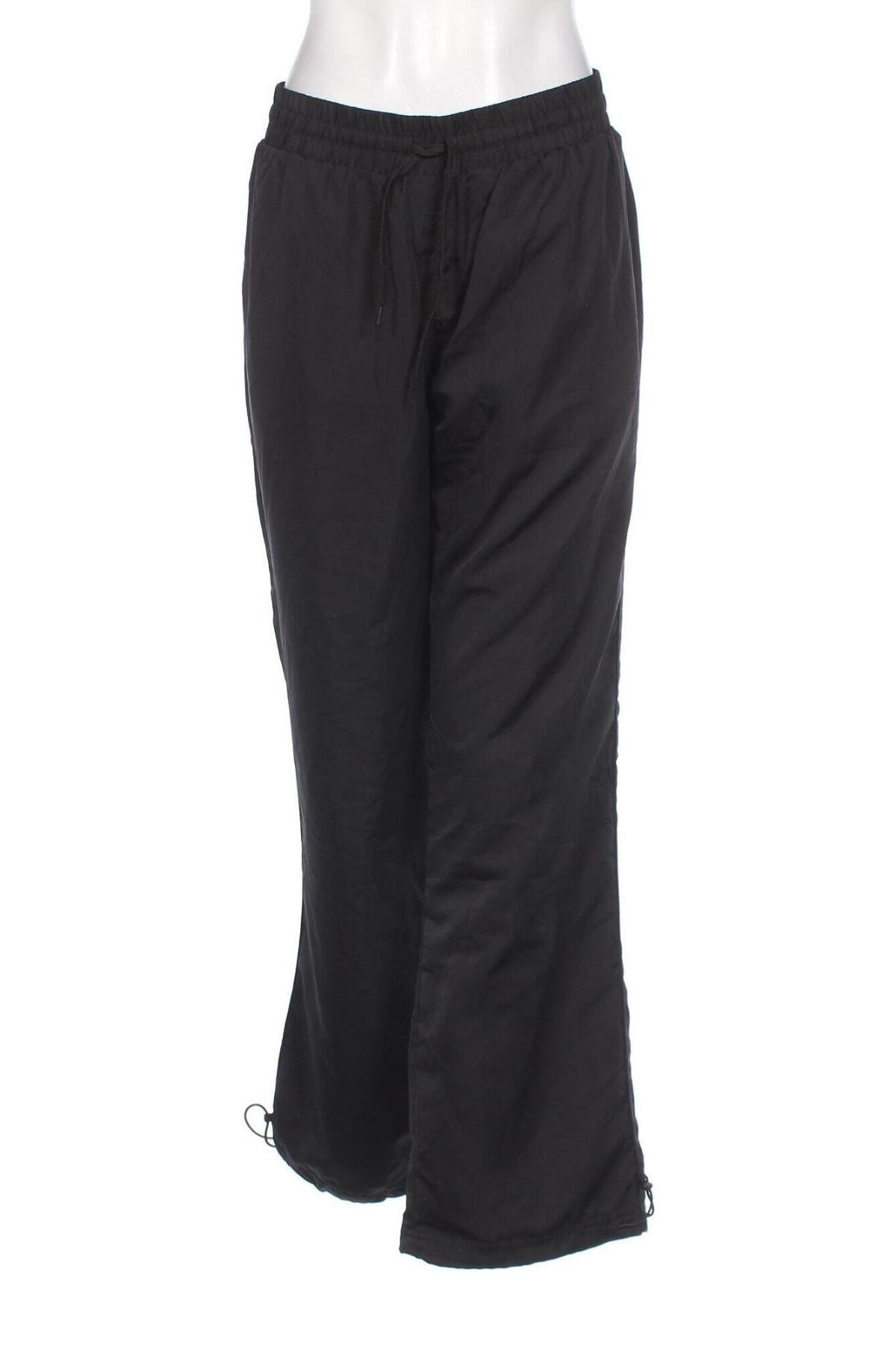 Γυναικείο αθλητικό παντελόνι Crane, Μέγεθος XL, Χρώμα Μαύρο, Τιμή 9,87 €
