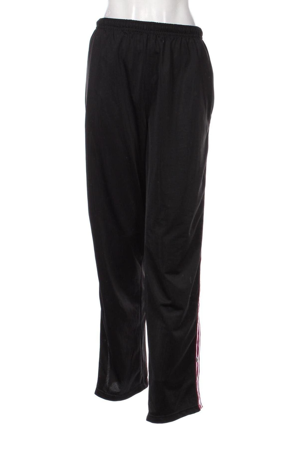 Γυναικείο αθλητικό παντελόνι Crane, Μέγεθος XL, Χρώμα Μαύρο, Τιμή 7,18 €