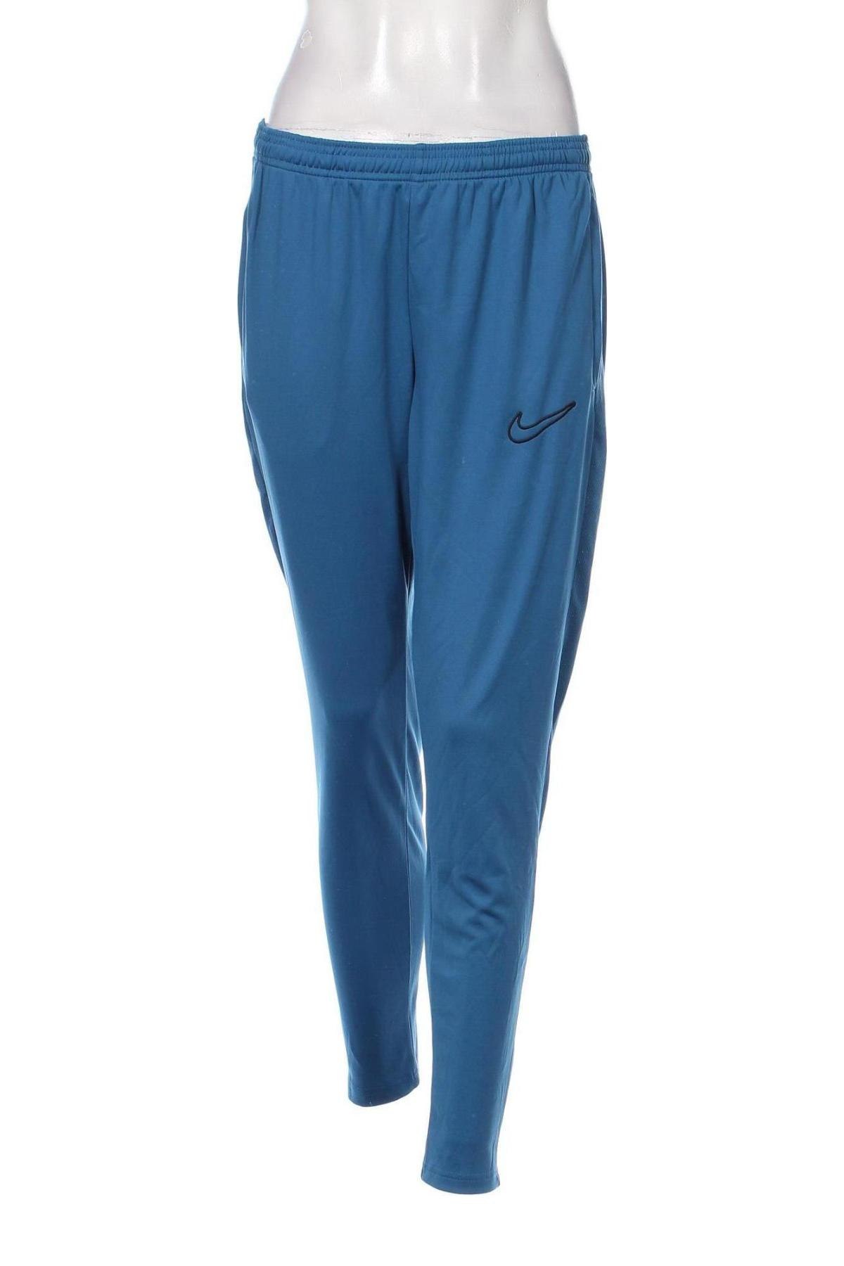 Γυναικείο αθλητικό παντελόνι Nike, Μέγεθος M, Χρώμα Μπλέ, Τιμή 25,36 €
