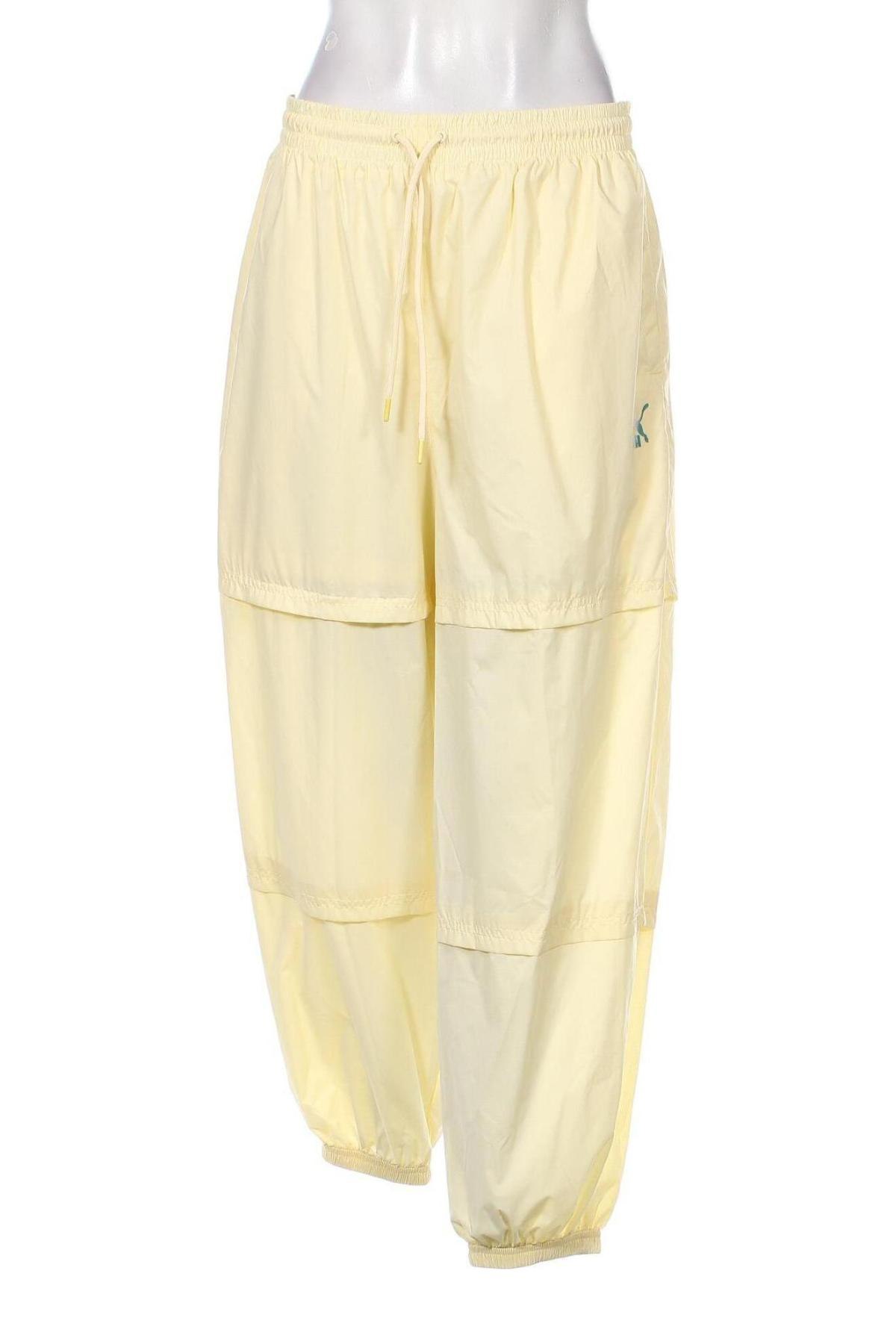Γυναικείο αθλητικό παντελόνι PUMA, Μέγεθος L, Χρώμα Κίτρινο, Τιμή 26,37 €