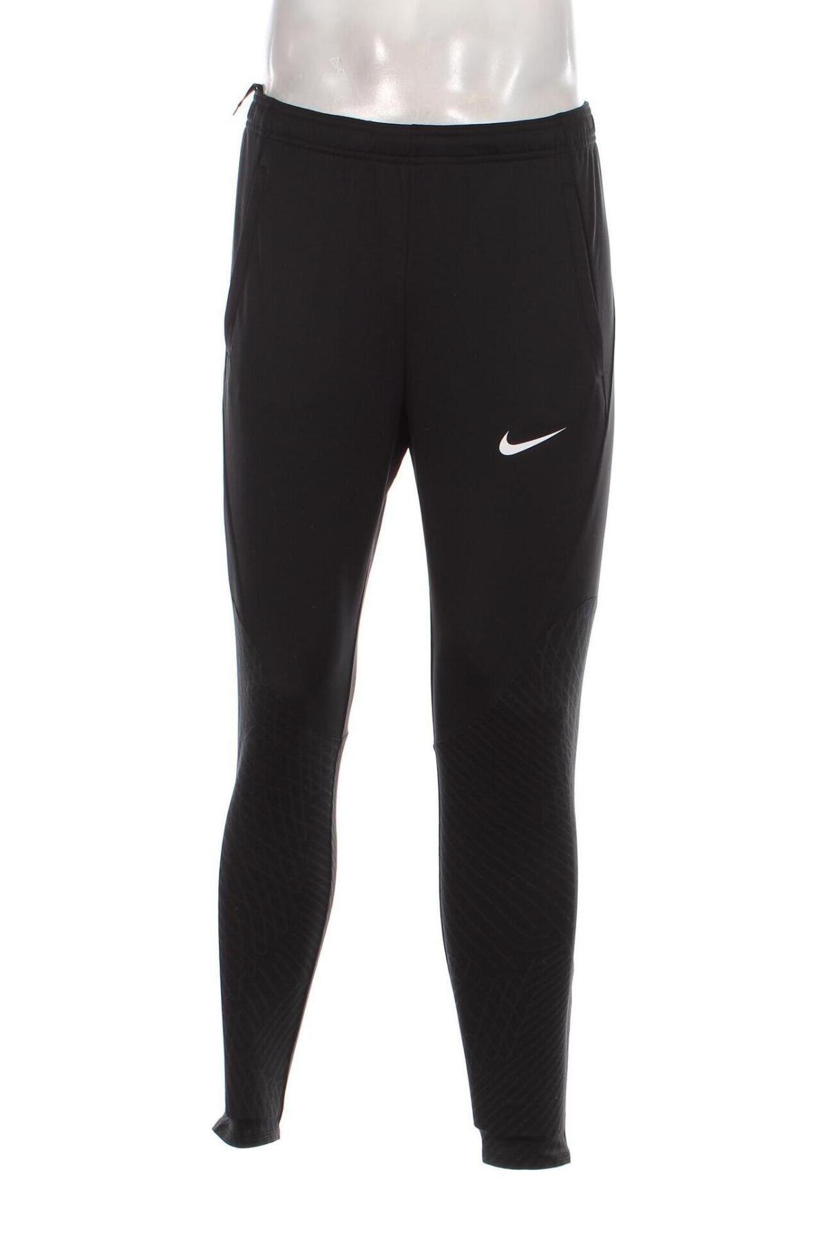 Pantaloni trening de bărbați Nike, Mărime M, Culoare Albastru, Preț 290,62 Lei
