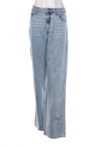 Damskie jeansy H&M, Rozmiar L, Kolor Niebieski, Cena 50,99 zł