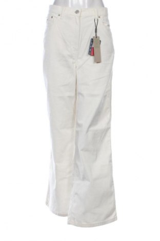 Pantaloni de velvet de femei Tommy Jeans, Mărime L, Culoare Ecru, Preț 684,99 Lei