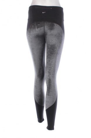 Damskie legginsy Nike, Rozmiar M, Kolor Kolorowy, Cena 52,99 zł