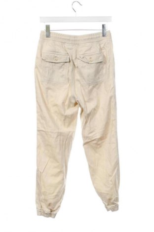 Damskie spodnie Gap, Rozmiar XS, Kolor Beżowy, Cena 44,99 zł