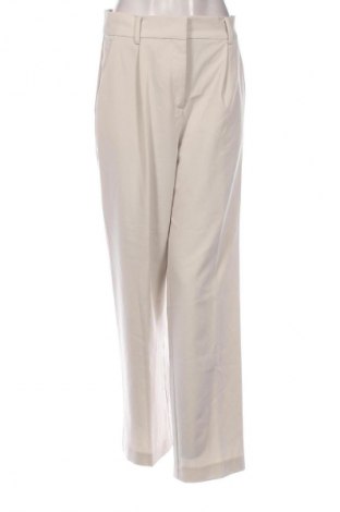 Damskie spodnie H&M, Rozmiar M, Kolor Beżowy, Cena 110,07 zł