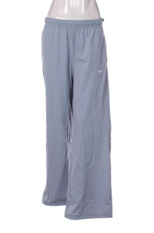 Dámské tepláky Nike, Velikost S, Barva Modrá, Cena  2 029,00 Kč