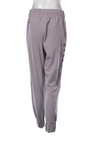 Damskie spodnie Under Armour, Rozmiar M, Kolor Fioletowy, Cena 56,99 zł