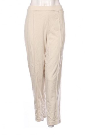 Damskie spodnie Uniqlo, Rozmiar XL, Kolor ecru, Cena 134,99 zł