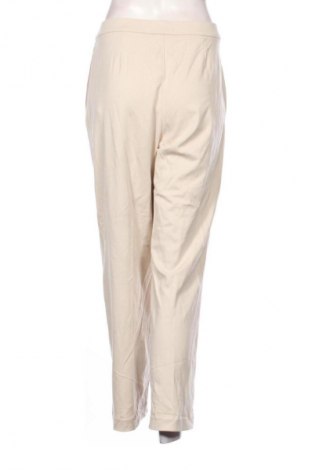 Damskie spodnie Uniqlo, Rozmiar XL, Kolor ecru, Cena 134,99 zł