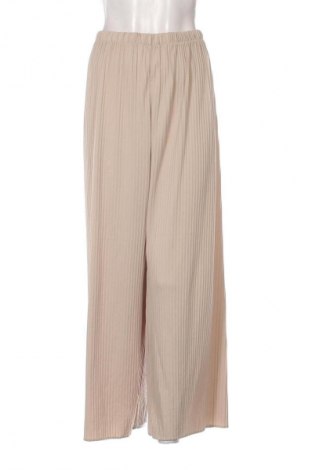 Damskie spodnie Uniqlo, Rozmiar XL, Kolor Beżowy, Cena 134,99 zł