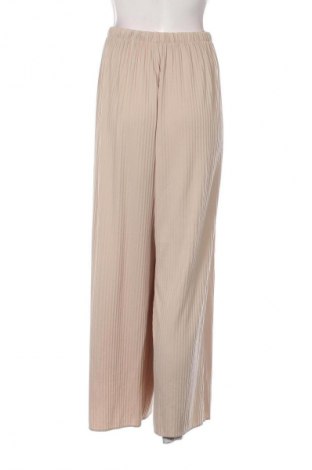 Damskie spodnie Uniqlo, Rozmiar XL, Kolor Beżowy, Cena 134,99 zł