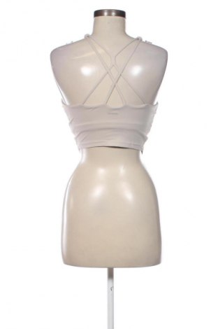 Női sport top Oysho, Méret M, Szín Ekrü
, Ár 3 997 Ft