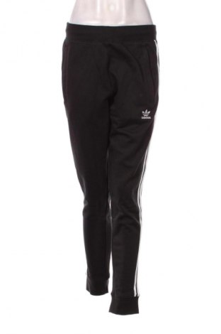 Damskie spodnie sportowe Adidas Originals, Rozmiar M, Kolor Czarny, Cena 305,99 zł