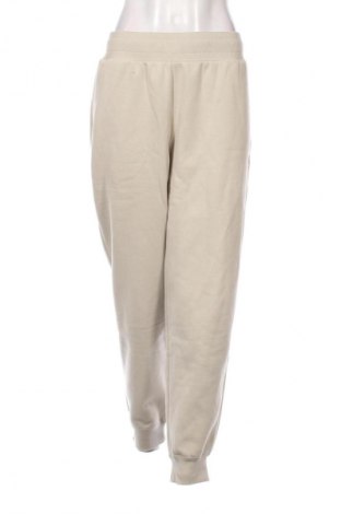 Női sport nadrág PUMA, Méret L, Szín Bézs, Ár 25 069 Ft