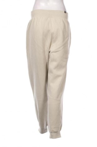 Női sport nadrág PUMA, Méret L, Szín Bézs, Ár 25 069 Ft