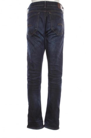 Męskie jeansy G-Star Raw, Rozmiar L, Kolor Niebieski, Cena 454,99 zł