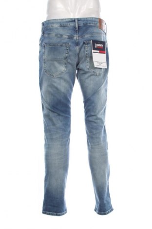 Męskie jeansy Tommy Jeans, Rozmiar M, Kolor Niebieski, Cena 406,99 zł