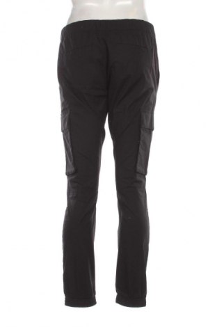 Pánske nohavice  Calvin Klein Jeans, Veľkosť M, Farba Čierna, Cena  90,95 €