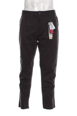 Pánske nohavice  Tommy Jeans, Veľkosť M, Farba Sivá, Cena  97,95 €