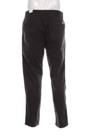 Pánske nohavice  Tommy Jeans, Veľkosť M, Farba Sivá, Cena  97,95 €