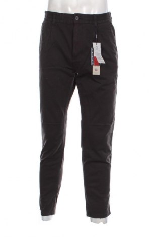 Pánske nohavice  Tommy Jeans, Veľkosť S, Farba Sivá, Cena  34,95 €
