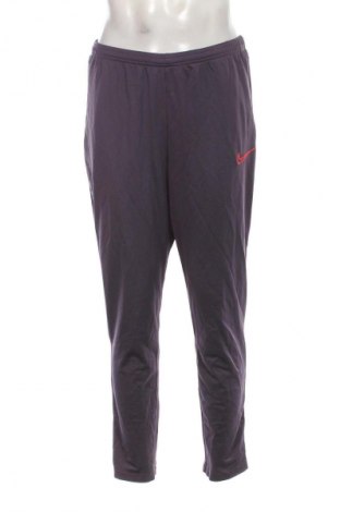 Męskie spodnie sportowe Nike, Rozmiar XL, Kolor Fioletowy, Cena 157,99 zł
