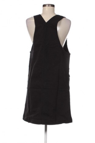 Latzkleid Monki, Größe M, Farbe Schwarz, Preis 42,99 €