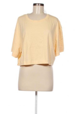 Γυναικείο t-shirt Weekday, Μέγεθος XL, Χρώμα Κίτρινο, Τιμή 4,87 €