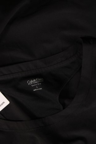 Damen T-Shirt Calvin Klein, Größe L, Farbe Schwarz, Preis 23,66 €