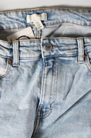 Damskie jeansy H&M, Rozmiar L, Kolor Niebieski, Cena 46,38 zł