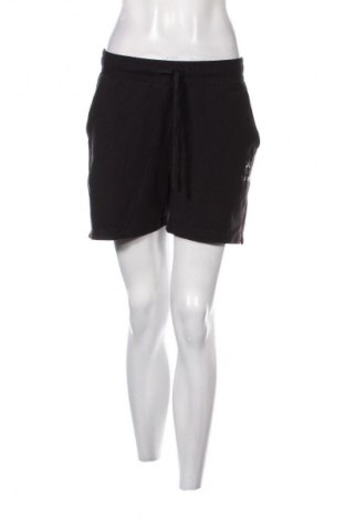 Γυναικείο κοντό παντελόνι Hummel, Μέγεθος L, Χρώμα Μαύρο, Τιμή 17,39 €