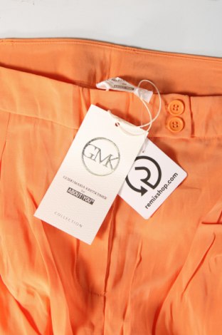 Damenhose Guido Maria Kretschmer for About You, Größe M, Farbe Orange, Preis € 21,57