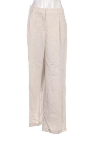 Damskie spodnie H&M, Rozmiar XL, Kolor Beżowy, Cena 73,57 zł