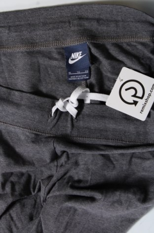 Damskie spodnie sportowe Nike, Rozmiar XL, Kolor Szary, Cena 131,14 zł